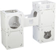 Weiße, modular aufgebaute Kartonboxen, teils verbunden, mit runden und katzenförmigen Ausschnitten, im Vordergrund.