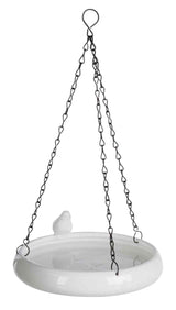 Weiße hängende Schale mit einem kleinen Vogeldekor und dunklen Metallketten zum Aufhängen.