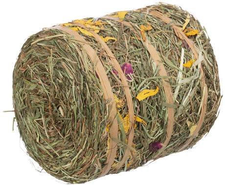 Zylinderförmiges Bündel aus getrocknetem Gras und Blumen mit gelben und violetten Blütenelementen, gebunden mit Bändern.
