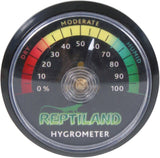 Rundes Hygrometer mit Anzeige von 0-100, farblich von Rot zu Grün verlaufend, Text „REPTILAND HYGROMETER“.