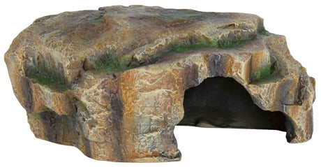 Gesteinsformation mit Höhle, braun und grünlich gefärbt, mit ungleichmäßiger Oberfläche und großem Zugang.