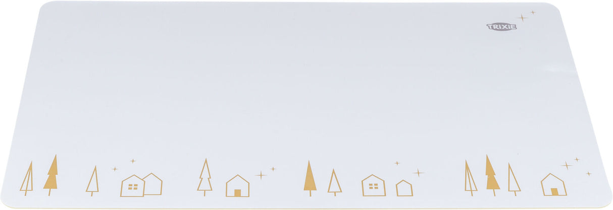 Weiße Unterlage mit goldenen Tannenbäumen und Häusern auf der unteren Seite, Trixie-Logo oben rechts.