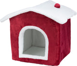 Rotes Hundehaus mit weißem Dach und kleinem roten Ball auf der Spitze, offene Vorderseite mit weißem Rand.