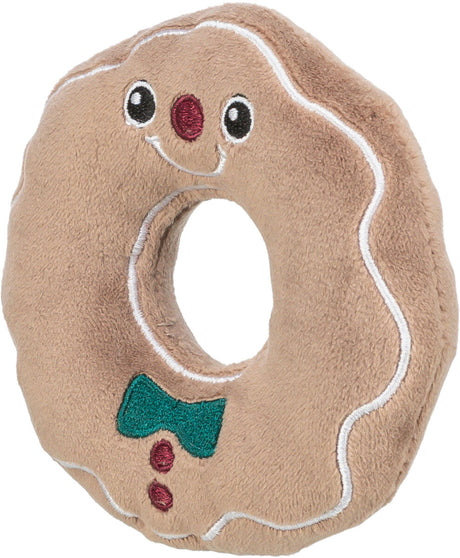 Brauner, runder Stoffring mit gesticktem Gesicht, roter Nase und grünem Fliegenmotiv, erinnert an einen Lebkuchenmann.